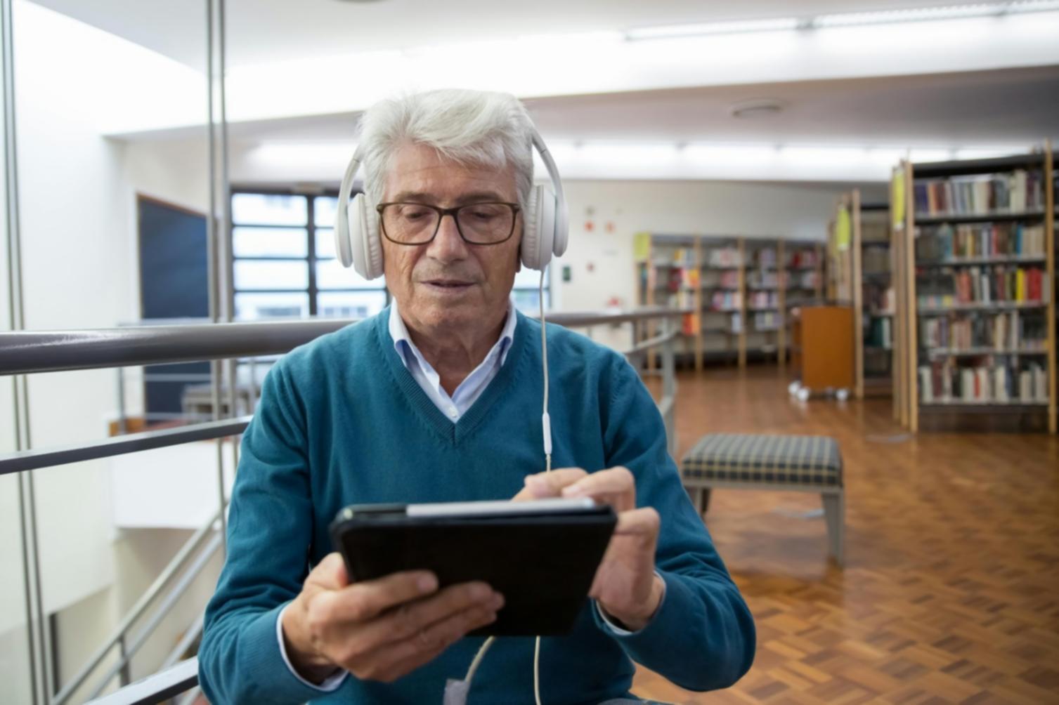 Support worker helping client with mobility assistance outdoors
